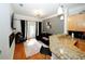 Spacious living room with hardwood floors and access to balcony at 799 Hammond Dr # 116, Atlanta, GA 30328