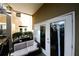 Private patio with a couch and sliding glass doors at 799 Hammond Dr # 116, Atlanta, GA 30328