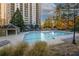 Inviting swimming pool with surrounding lounge chairs at 799 Hammond Dr # 116, Atlanta, GA 30328