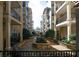 Shared courtyard with stonework, landscaping, and building access at 799 Hammond Dr # 116, Atlanta, GA 30328
