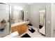 Main bathroom with a large vanity, toilet, and shower at 799 Hammond Dr # 116, Atlanta, GA 30328