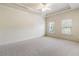 Spacious bedroom with carpeted floor and large windows at 1256 Stonecroft Way, Marietta, GA 30062