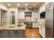 Modern kitchen featuring granite island and custom cabinetry at 1256 Stonecroft Way, Marietta, GA 30062