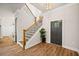 Elegant entryway with hardwood floors and a staircase at 2788 Browns Mill Se Rd, Atlanta, GA 30354