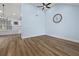 Light and airy living room with vaulted ceilings and wood-look flooring at 6223 Apa Ln, Lithonia, GA 30058