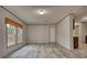 Spacious living room with wood-look vinyl flooring and neutral walls at 2253 Cole Dr, Social Circle, GA 30025