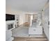 Living room with fireplace, wood floors, and view of kitchen at 4701 Flat Shoals Rd # 54C, Union City, GA 30291