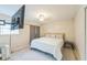 Spacious bedroom with king-size bed and wall-mounted TV at 4701 Flat Shoals Rd # 54C, Union City, GA 30291
