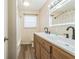 Bathroom with double sinks, wood vanity, and tub shower at 4701 Flat Shoals Rd # 54C, Union City, GA 30291