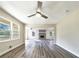 Open concept living room and dining area with hardwood floors at 3811 Reynolds Rd, Douglasville, GA 30135