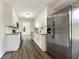 Modern kitchen with stainless steel appliances and granite countertops at 3811 Reynolds Rd, Douglasville, GA 30135