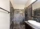 Updated bathroom with a walk-in shower and slate tile at 3811 Reynolds Rd, Douglasville, GA 30135