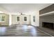 Bright living room with fireplace and laminate flooring at 3811 Reynolds Rd, Douglasville, GA 30135