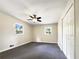 Bright bedroom with grey carpet and ceiling fan at 3811 Reynolds Rd, Douglasville, GA 30135