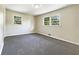 Spacious bedroom with grey carpet and double-door closet at 3811 Reynolds Rd, Douglasville, GA 30135