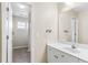 Bathroom with single sink and access to laundry at 436 Gold Xing, Canton, GA 30114