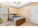 Bright bedroom with a queen-size bed and plenty of natural light at 4092 Arabian Way, Snellville, GA 30039