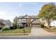 Two-story house with a driveway and landscaping at 816 Buffington Way, Canton, GA 30115