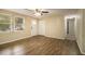 Spacious living room with wood-look floors at 6940 Kimberly Mill Rd, Atlanta, GA 30349