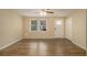 Living room featuring wood-look floors and ceiling fan at 6940 Kimberly Mill Rd, Atlanta, GA 30349