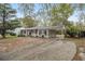 House with carport and large yard at 6940 Kimberly Mill Rd, Atlanta, GA 30349