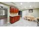 Bright kitchen with granite countertops and ample wood cabinets at 4002 Phylis Pl, Decatur, GA 30035