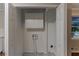Convenient laundry closet with overhead cabinets at 2191 Miriam Ln, Decatur, GA 30032