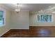 Hardwood floor dining room with neutral walls and large windows at 2191 Miriam Ln, Decatur, GA 30032