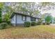 Side view of the house showcasing the well-maintained lawn at 2191 Miriam Ln, Decatur, GA 30032