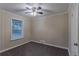 Charming bedroom with a window and ceiling fan at 2191 Miriam Ln, Decatur, GA 30032