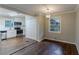 Bright dining area with hardwood floors and a view into the kitchen at 2191 Miriam Ln, Decatur, GA 30032