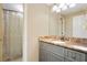 Bathroom with grey vanity and marble countertop at 226 Mclaren Gates Dr, Marietta, GA 30060