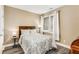 Cozy bedroom featuring a double bed and large window at 226 Mclaren Gates Dr, Marietta, GA 30060