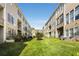 View of townhome community with manicured lawn at 226 Mclaren Gates Dr, Marietta, GA 30060