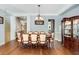 Formal dining room with hardwood floors, chandelier, and large table at 226 Mclaren Gates Dr, Marietta, GA 30060