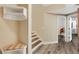 Inviting entryway with built-in bench, shelving, and stairs at 226 Mclaren Gates Dr, Marietta, GA 30060
