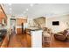 Open kitchen features breakfast bar, hardwood floors and stainless steel appliances at 226 Mclaren Gates Dr, Marietta, GA 30060