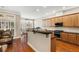 Kitchen features an island with seating and hardwood floors at 226 Mclaren Gates Dr, Marietta, GA 30060