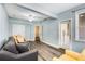 Spacious living area with a comfy couch and patio access at 226 Mclaren Gates Dr, Marietta, GA 30060