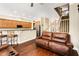 Living room with hardwood floors and leather couches at 226 Mclaren Gates Dr, Marietta, GA 30060