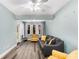Relaxing living room with grey sofa and access to a patio at 226 Mclaren Gates Dr, Marietta, GA 30060