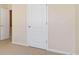 Bedroom with neutral walls, carpet, and closet at 4911 Crinklepoint Ct, Douglasville, GA 30134