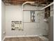 Unfinished basement area with exposed plumbing and mechanicals at 4027 Evelyn Dr, Powder Springs, GA 30127