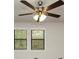 Bright bedroom with ceiling fan and ample closet space at 4027 Evelyn Dr, Powder Springs, GA 30127