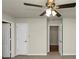 Spacious bedroom with double closets and ceiling fan at 4027 Evelyn Dr, Powder Springs, GA 30127