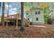 House exterior with a deck and large backyard at 4027 Evelyn Dr, Powder Springs, GA 30127