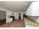 Open concept kitchen with granite countertops and stainless steel appliances at 4027 Evelyn Dr, Powder Springs, GA 30127