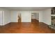 Open concept living room with hardwood floors at 4027 Evelyn Dr, Powder Springs, GA 30127