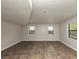 Spacious living area with tile floors and large windows at 4027 Evelyn Dr, Powder Springs, GA 30127