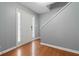 Bright entryway with hardwood floors and staircase at 310 Overbend Sw Lndg, Marietta, GA 30008